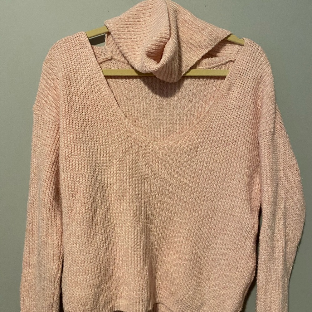 Turtle neck sweater with cut out